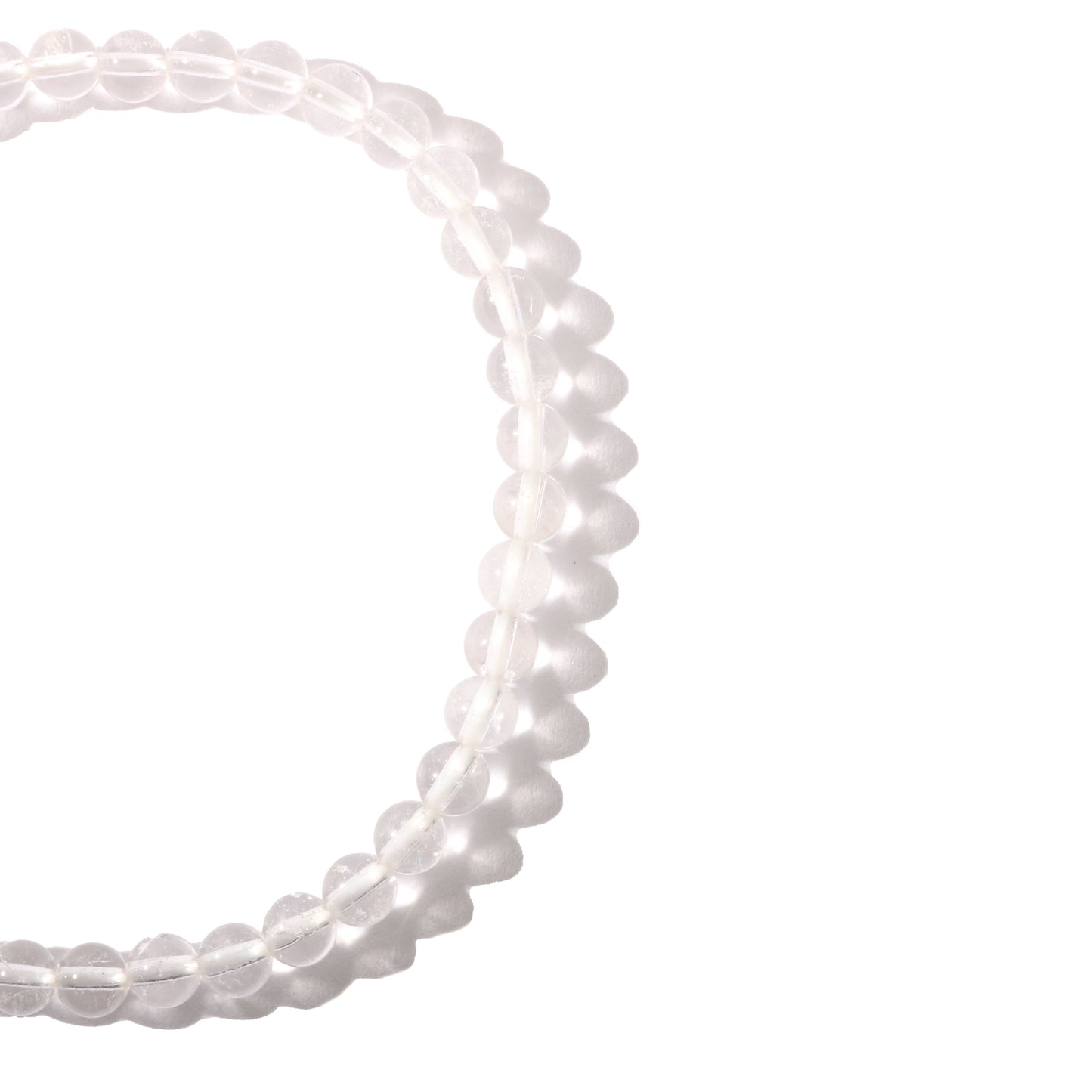 Clear quartz crystal bracelet worn on wrist for amplified healing energy