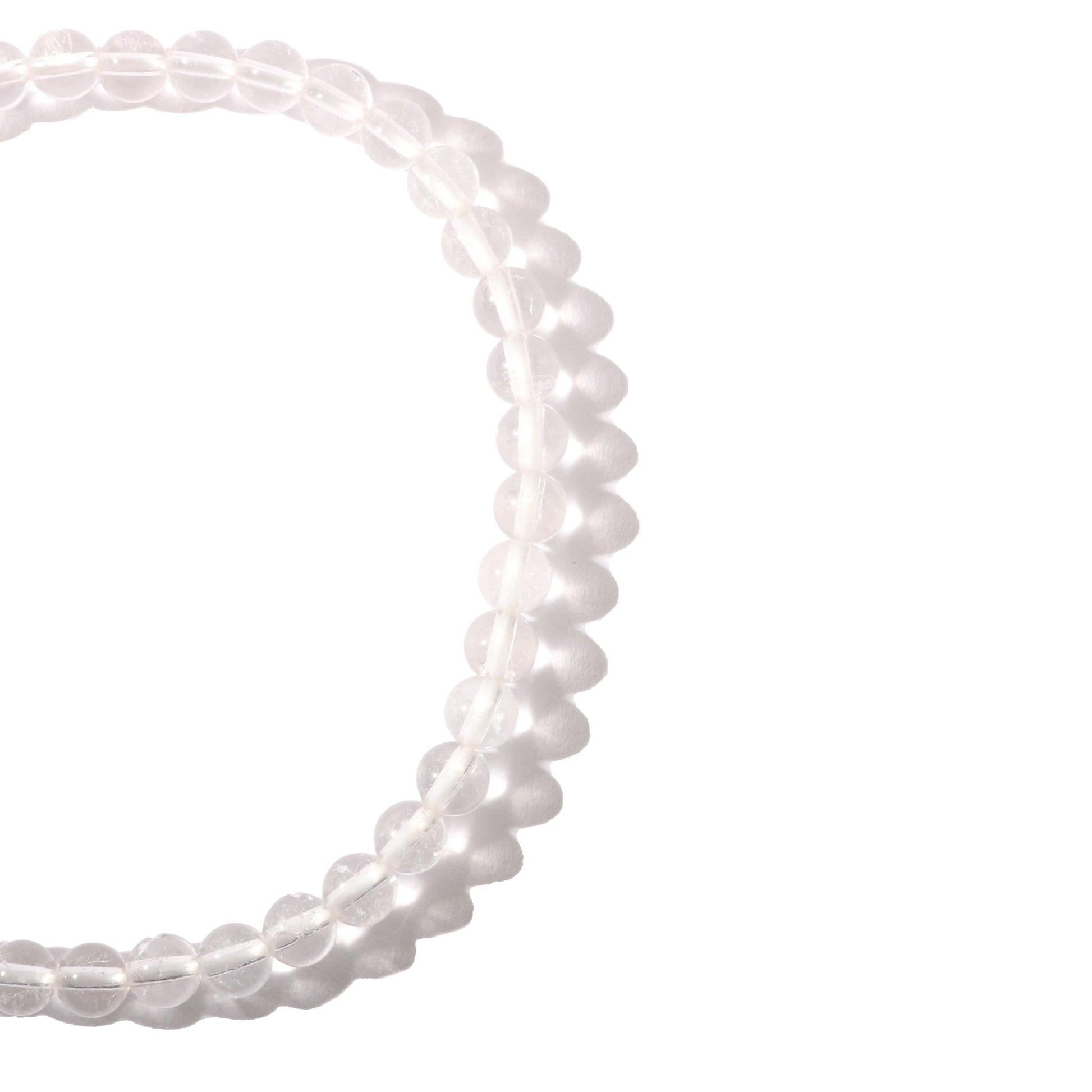 Clear quartz crystal bracelet worn on wrist for amplified healing energy