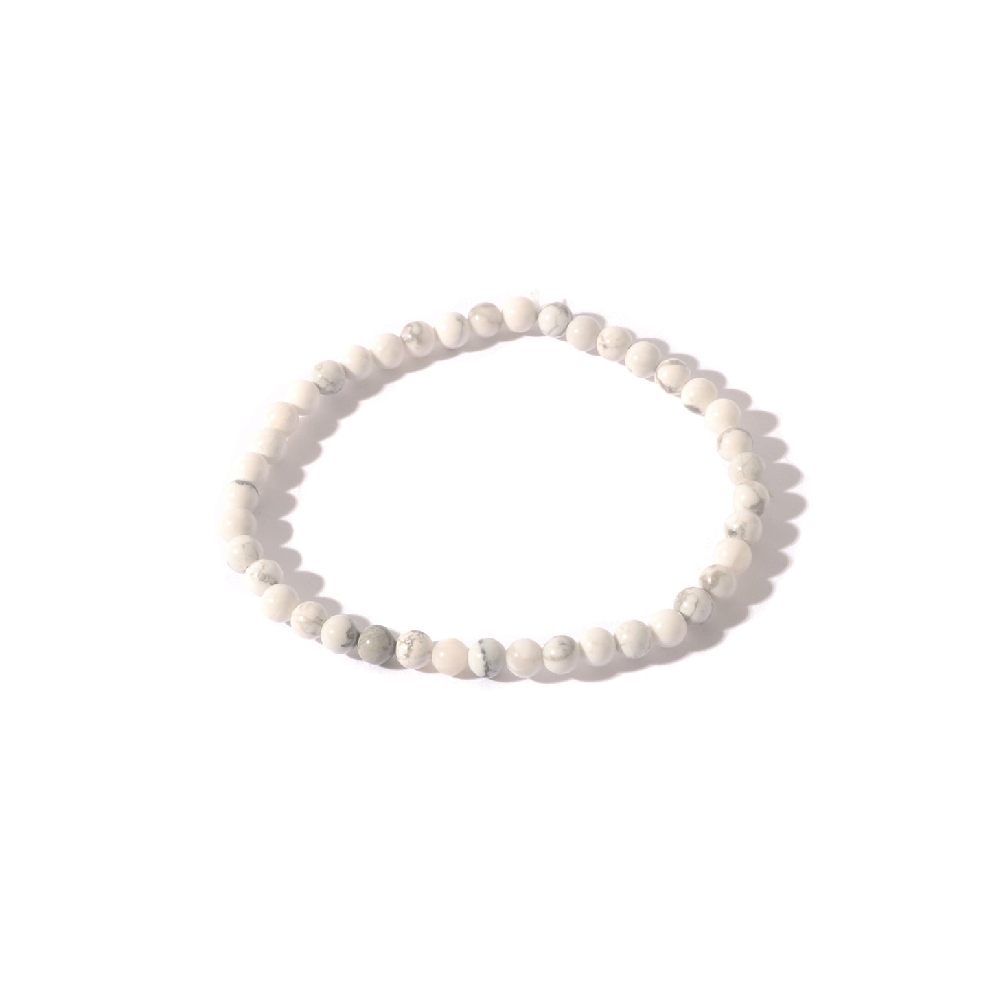 Howlite bracelet close-up showing natural white stone with grey veining