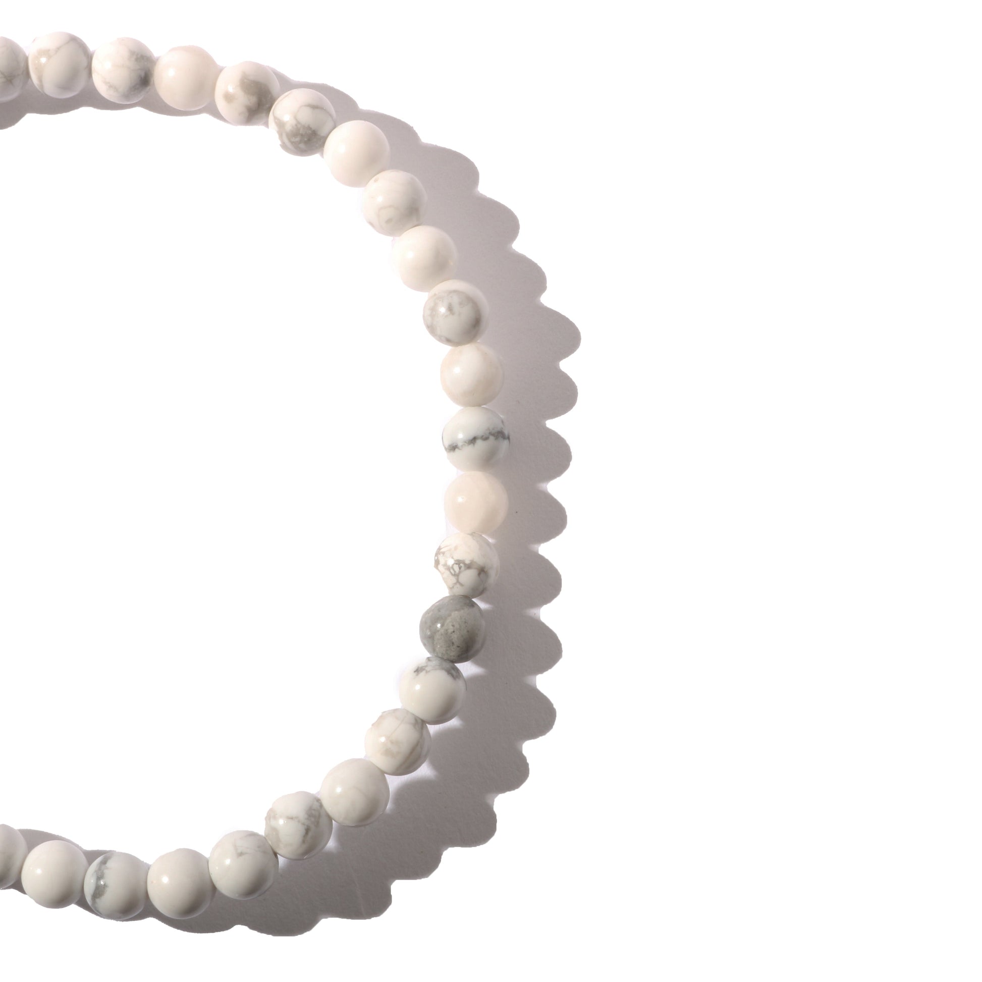 White howlite crystal bracelet worn on wrist for calming energy