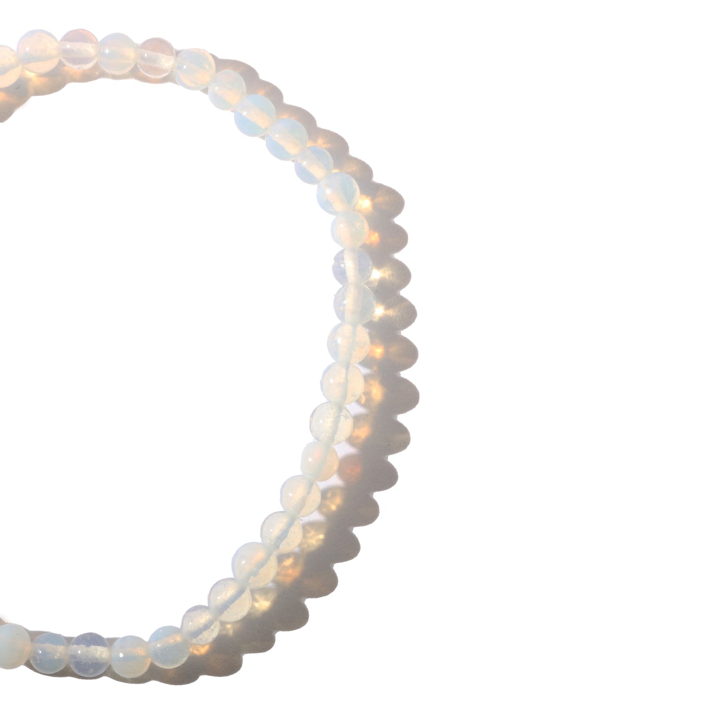 Opalite bracelet close-up showing soft milky iridescent glow