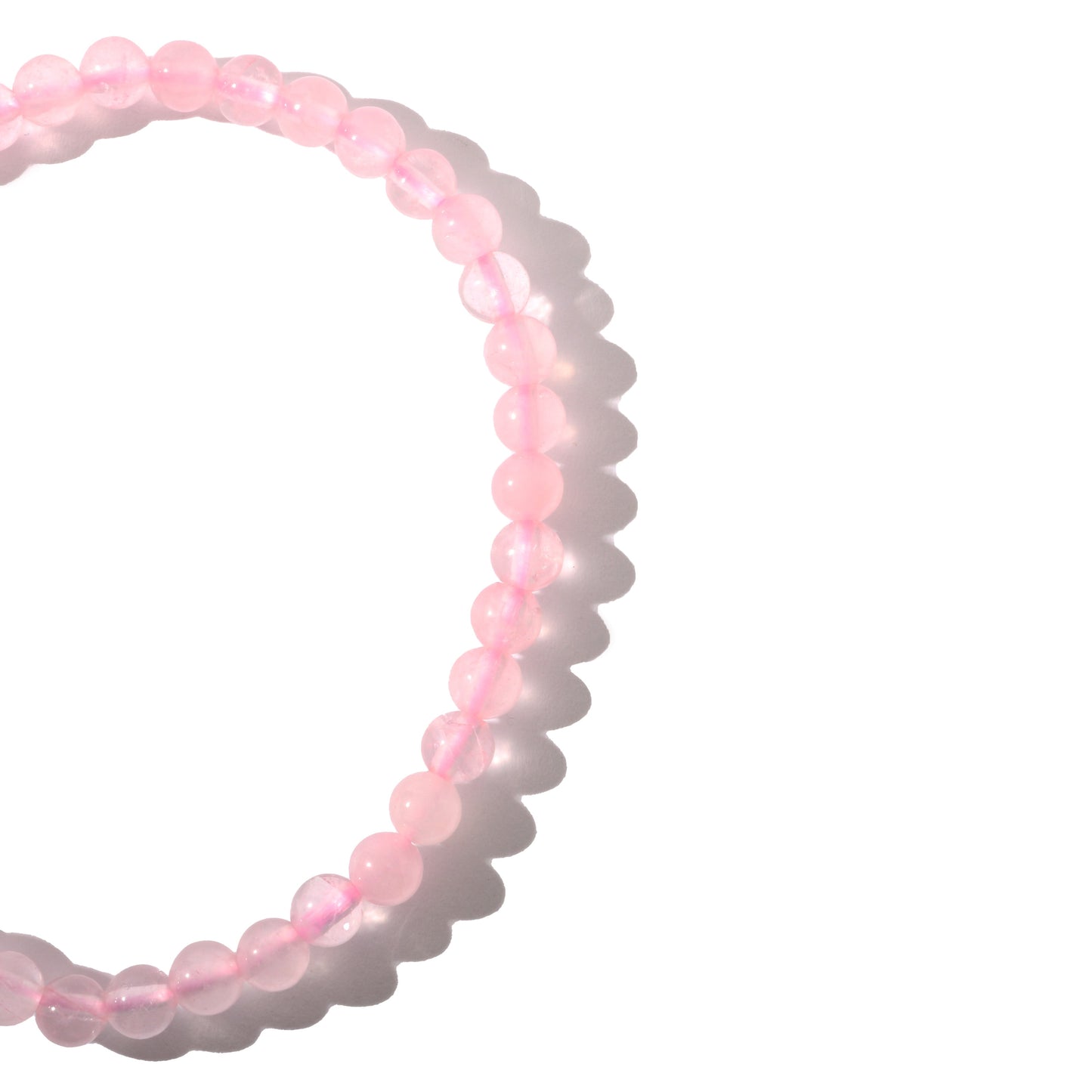 Gentle rose quartz crystal bracelet worn on wrist for love energy