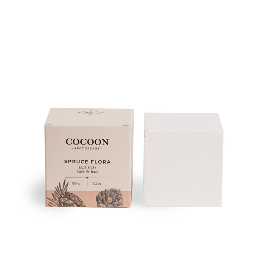 Cocoon Apothecary Spruce Flora bath cake with packaging on a white background