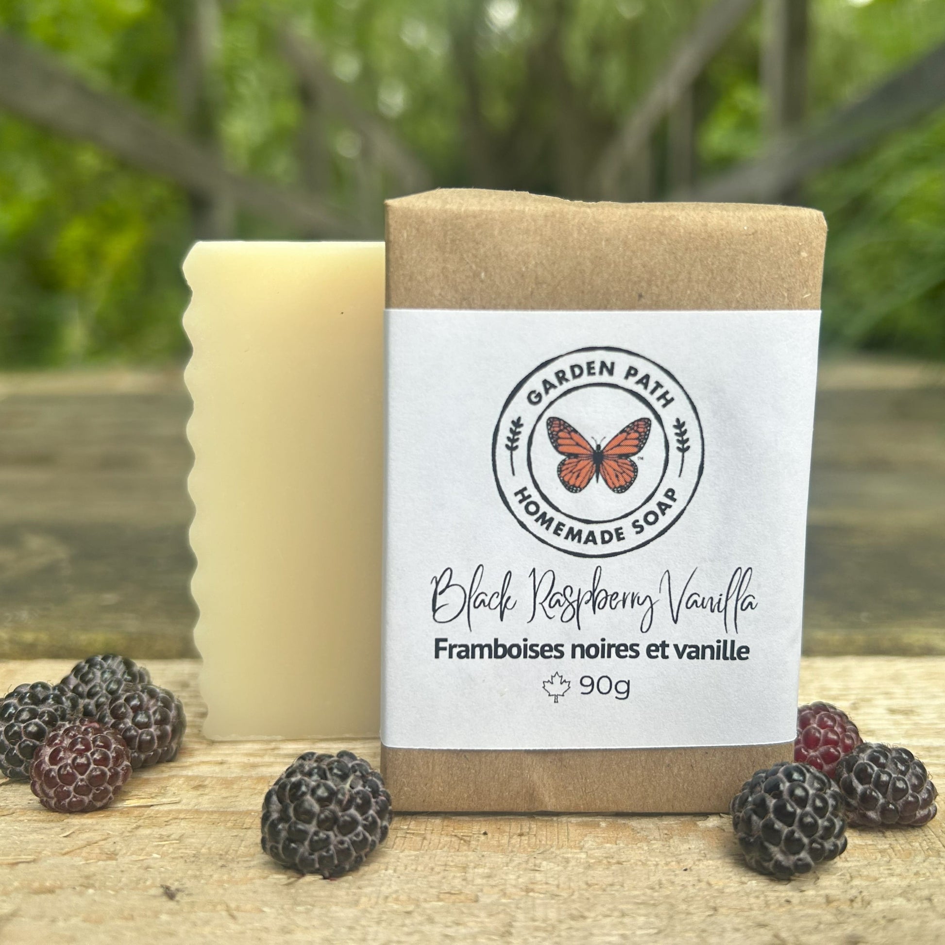 Image 1 (original): Black raspberry vanilla natural bar soap handmade in Canada — cold process soap with dark plum and warm vanilla fragrance, 90g