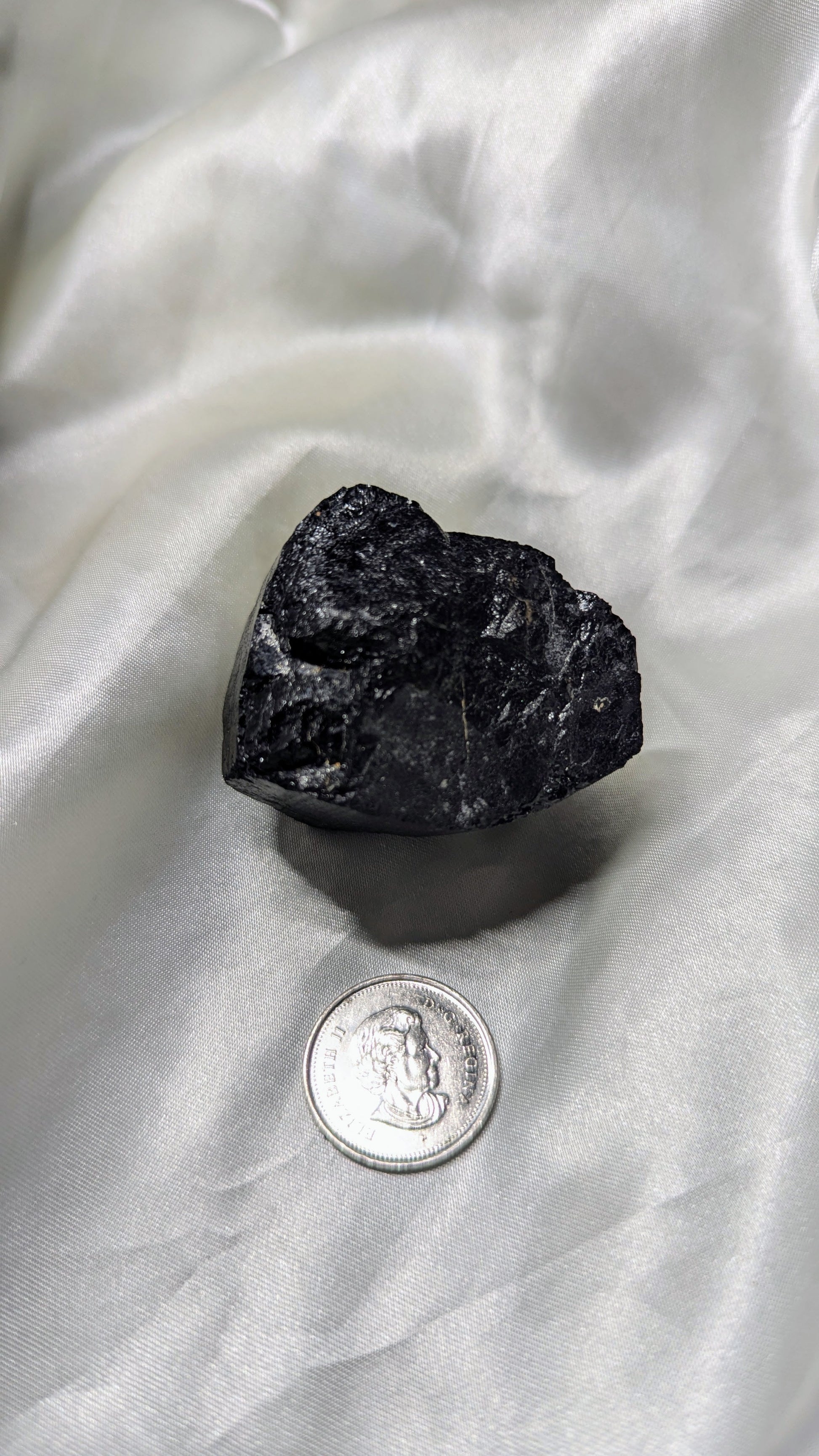 Raw black tourmaline crystal chunk for EMF protection and negative energy clearing