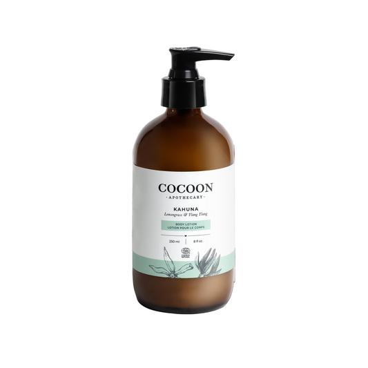 Brown bottle of body lotion with pump and 'Cocoon' label on a white background