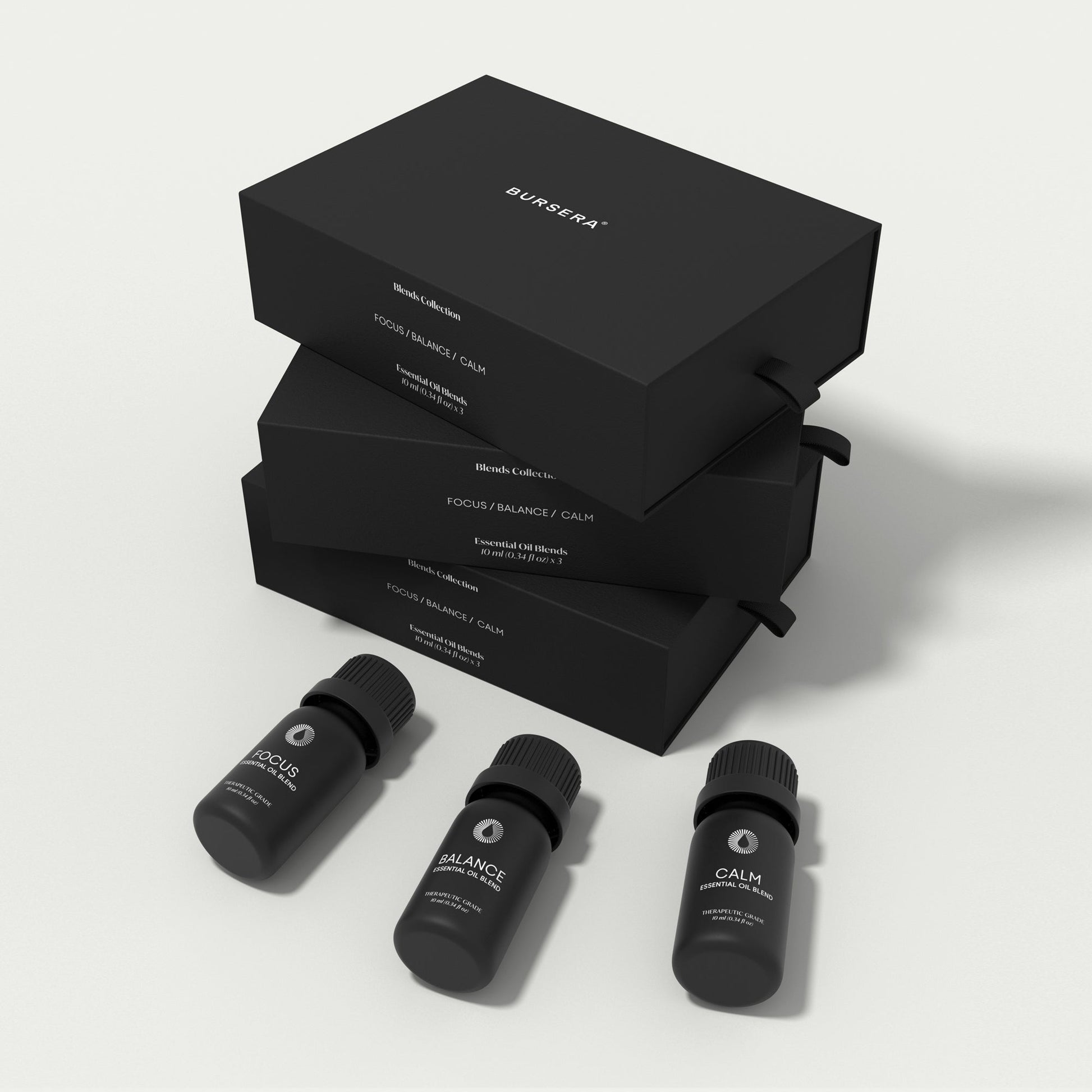 blends collection essential oil set aromatherapy with labels and a black box on a white background