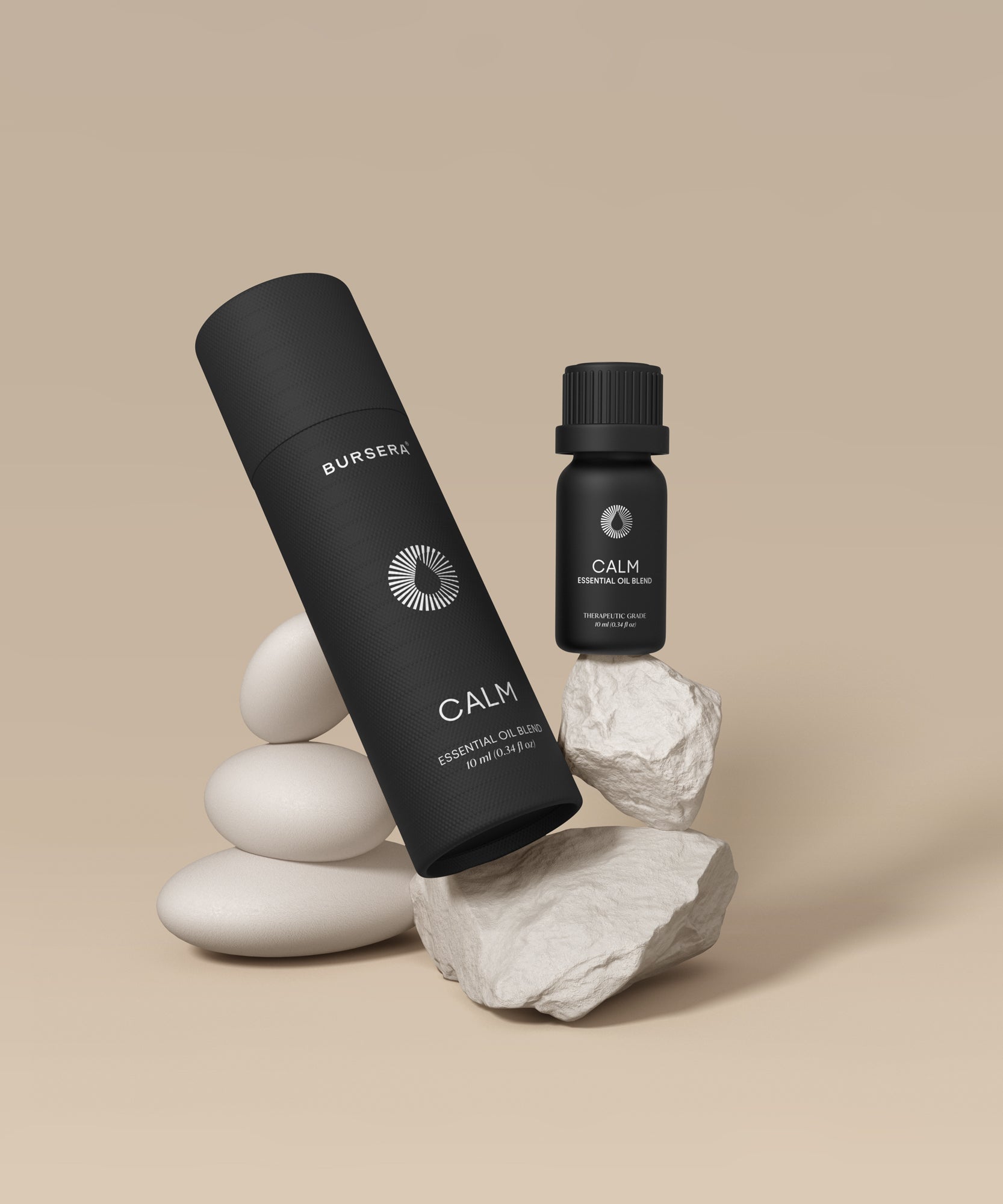 calm essential oil blend aromatherapy on a beige background with stones.