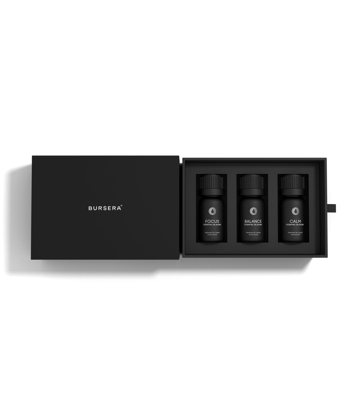 Three black bottles in a black open box with 'Bursera' branding on a white background