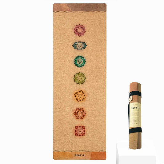Cork yoga mat with chakra symbols and Scoria branding on a white background