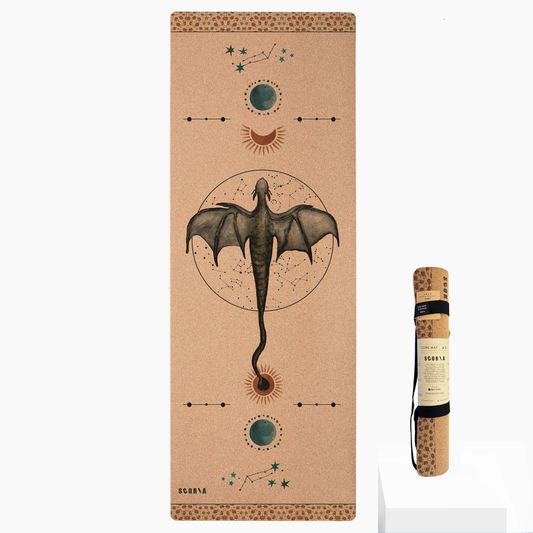 cork yoga mat with dragon design and rolled up version in packaging
