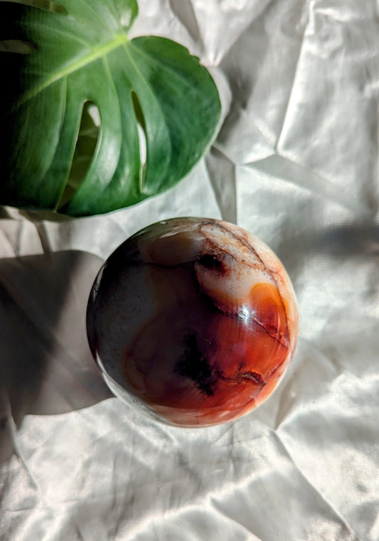 Energizing and passion-igniting carnelian sphere for motivation, courage and vitality