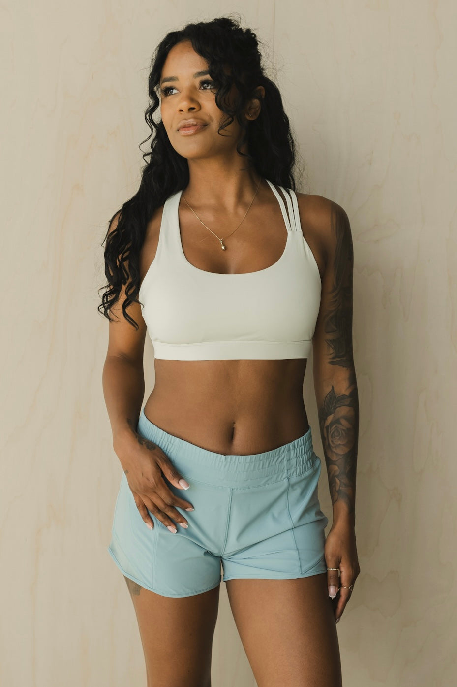 front view of woman wearing Ready for It shorts in hint of azure blue for workouts and casual wear