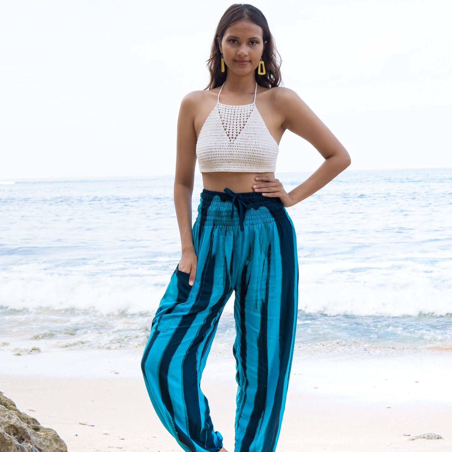 Handmade bold abstract tie dye Bali pants teal black front view