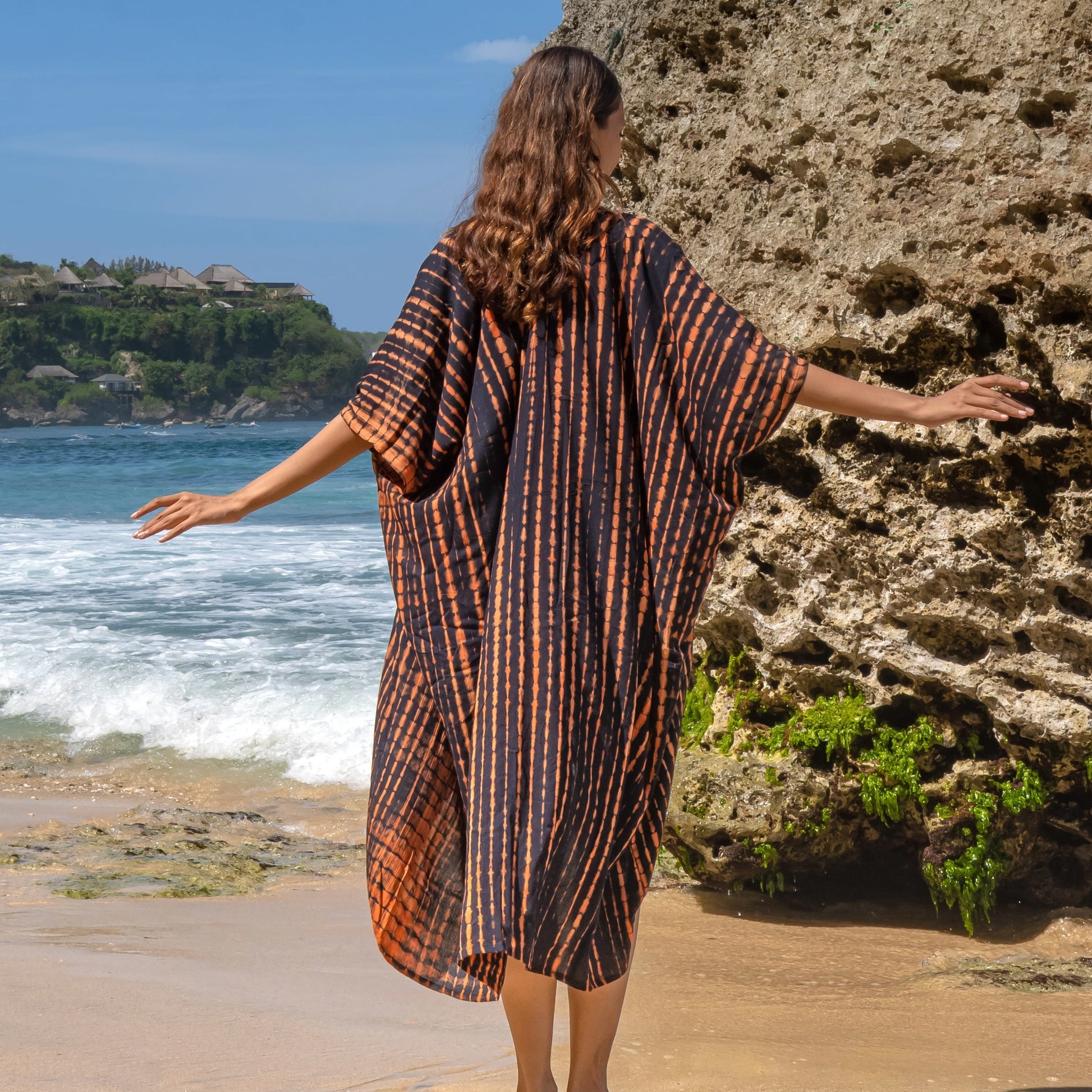 orange and black tie dye long kimono Bali handmade boho beach cover up back view
