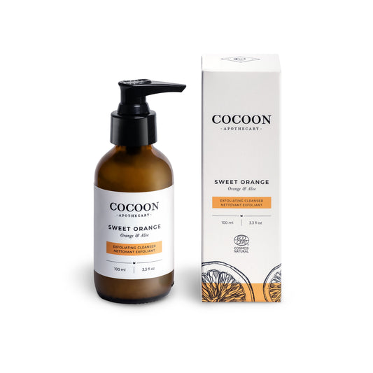 Cocoon Sweet Orange skincare facial cleanser with pump bottle and packaging box on a white background
