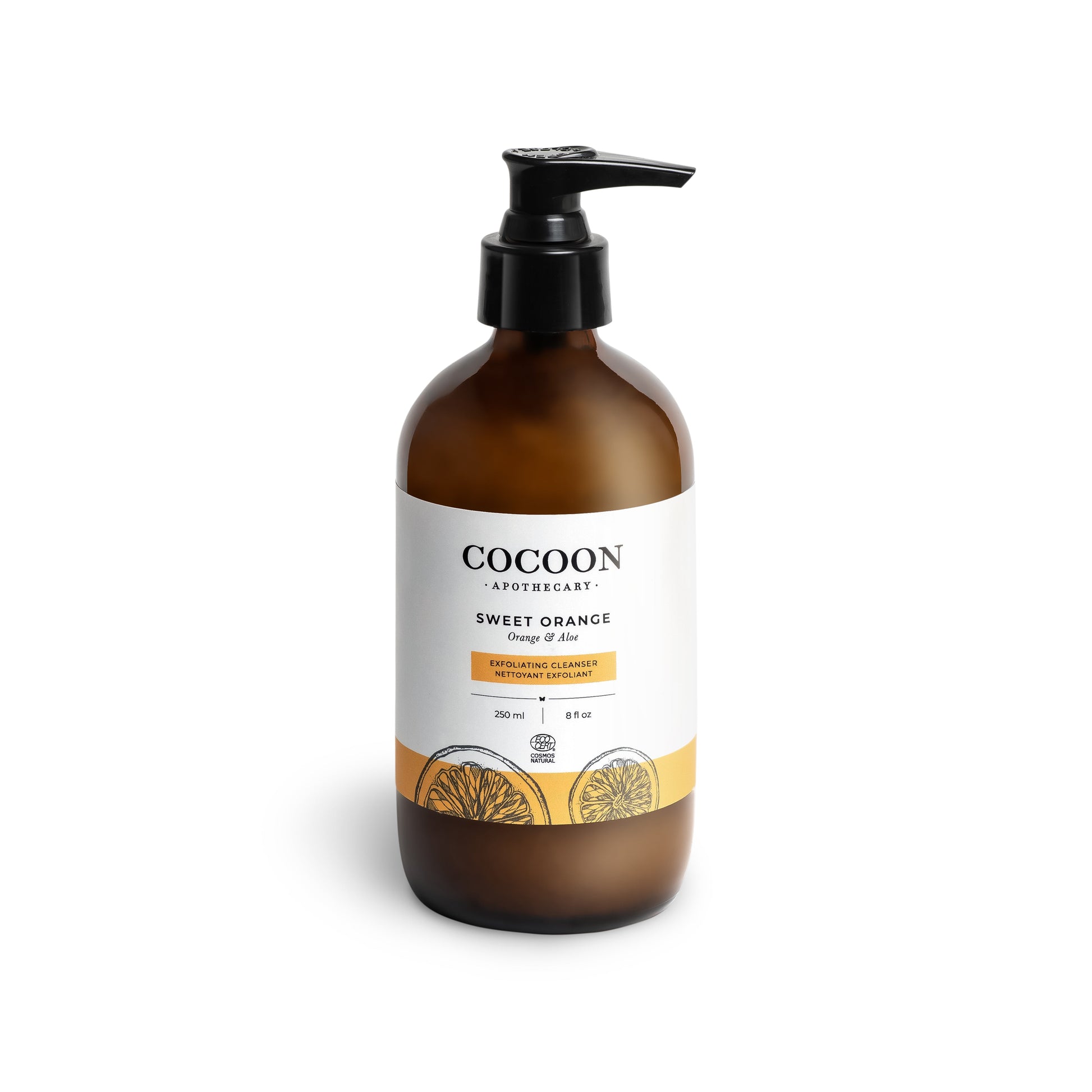 Brown bottle of sweet orange facial cleanser with pump and 'Cocoon' label on a white background