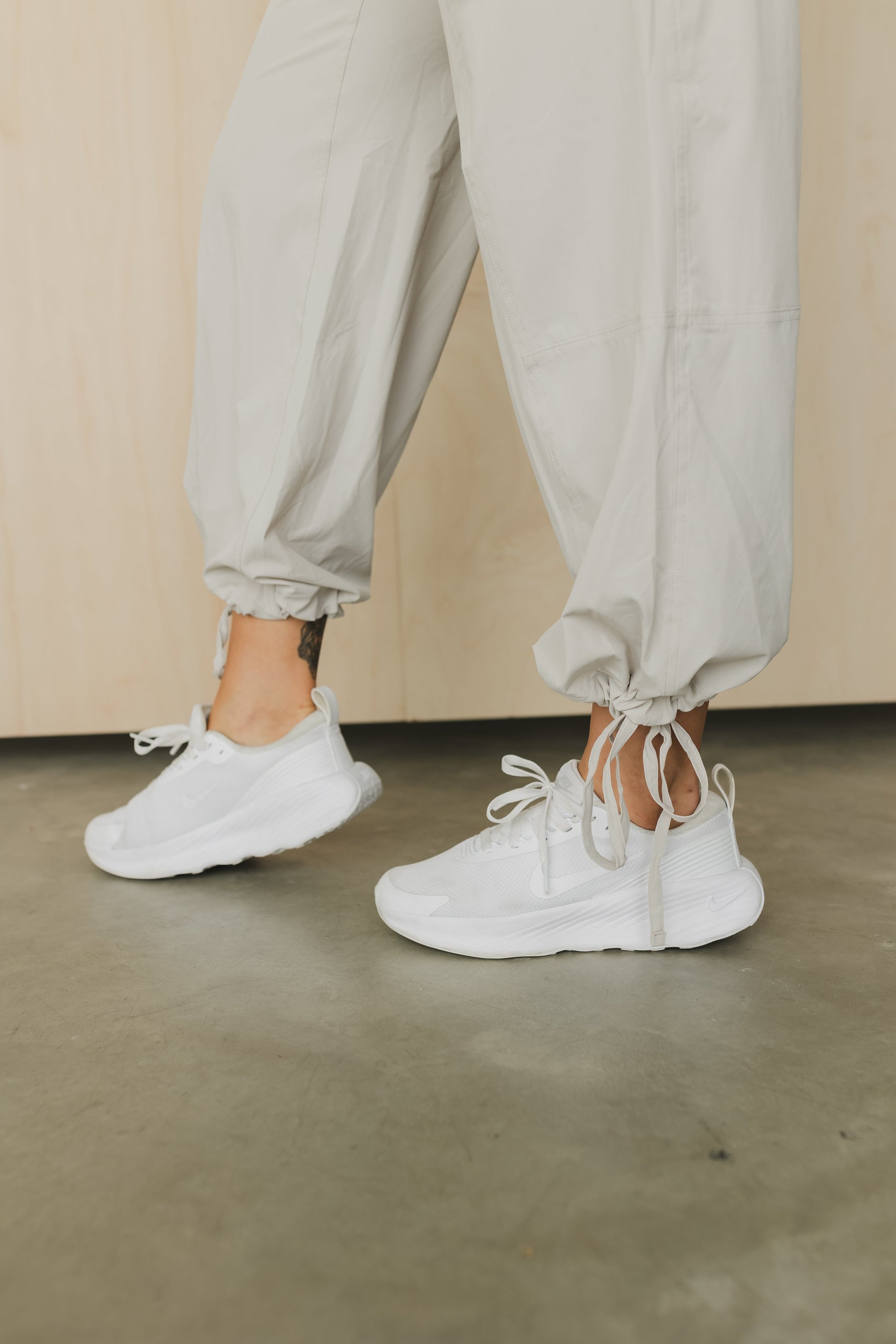ankle view of a woman wearing cargo pant in birch bark for outdoor wear and casual athleisure