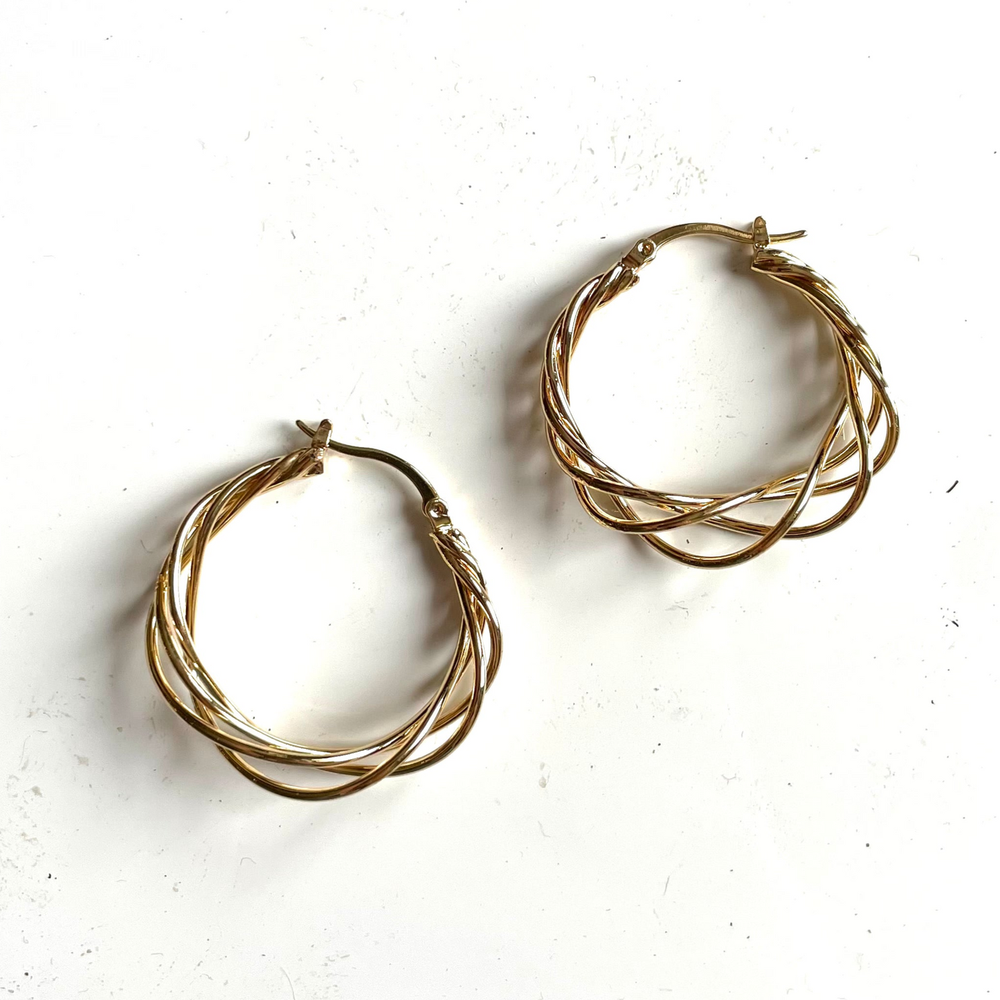 Gold plate twist hoop earrings top view minimalist everyday jewelry handmade in bali