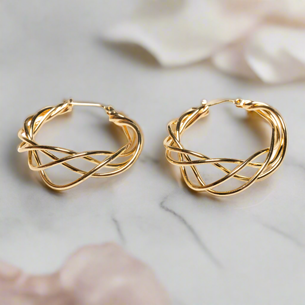 Gold plate twist hoop earrings up close minimalist everyday jewelry handmade in bali