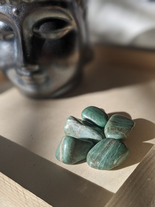 Balancing and growth-inspiring green banded agate for harmony and emotional stability