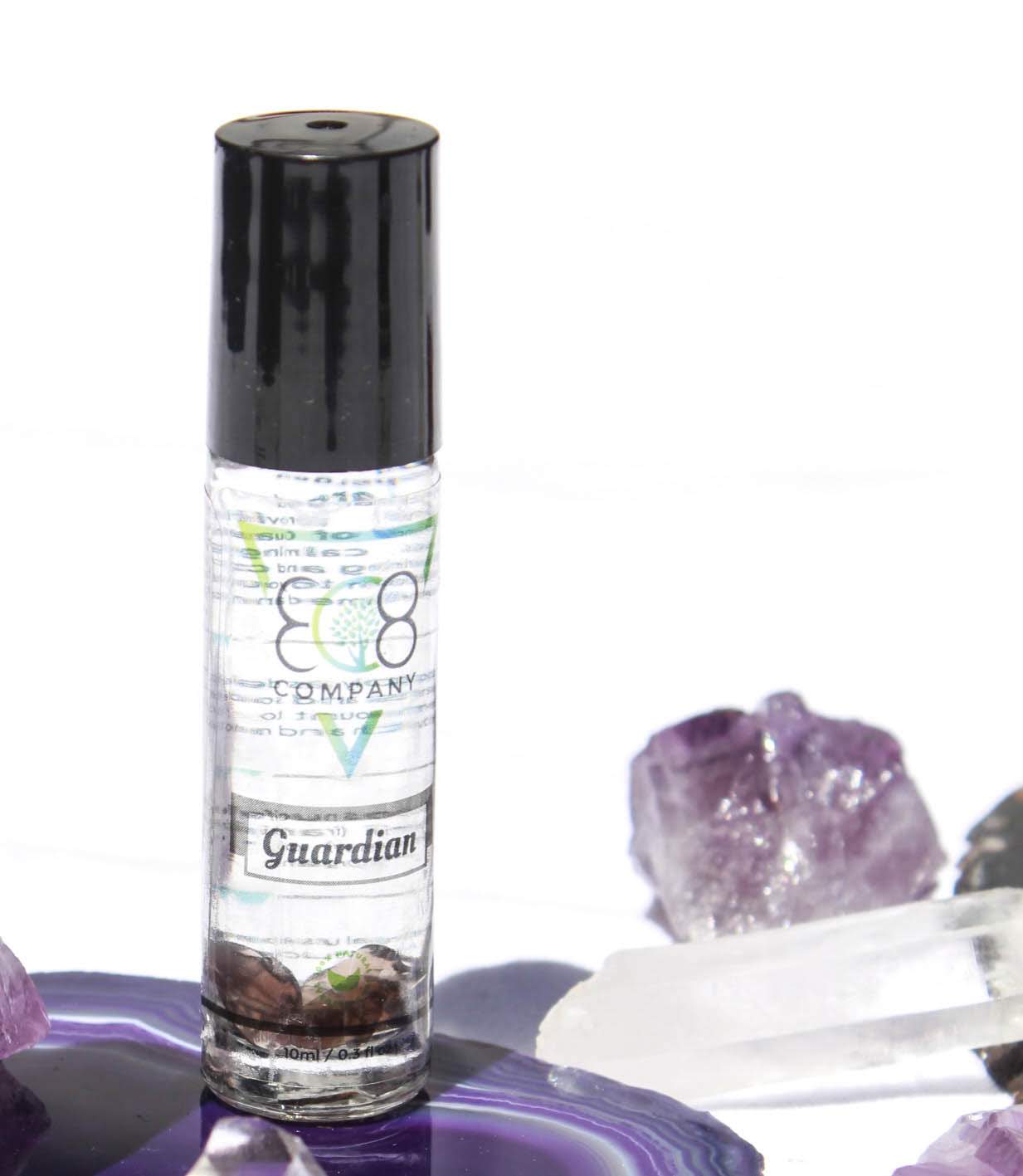 Guardian gemstone roller close-up showing crystal roller and bottle detail
