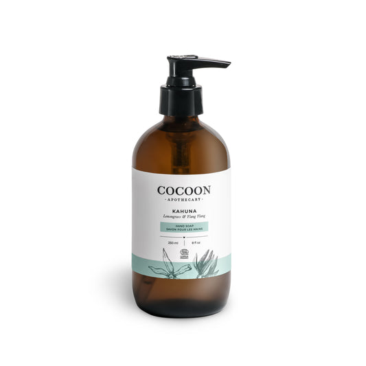 Kahuna liquid hand soap by Cocoon Apothecary in glass pump bottle with shadow detail