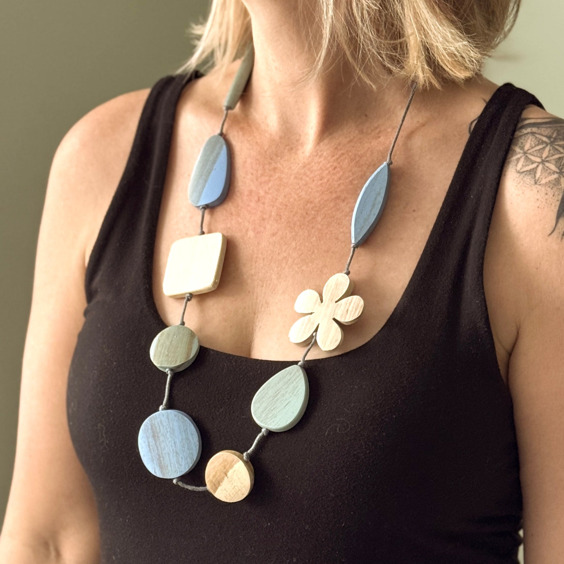 Long mixed shape wooden necklace Bali handmade boho artisan jewelry blue cream green