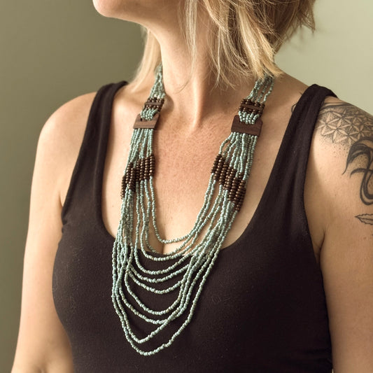 Multi strand wooden ring necklace Bali handmade boho jewelry green and brown