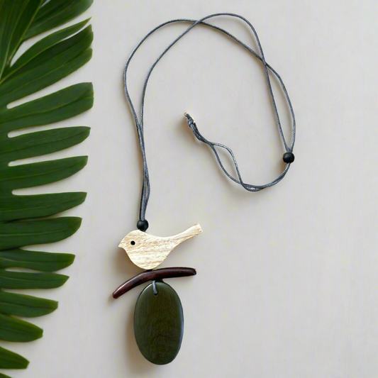 Wooden bird on a branch necklace Bali handmade boho artisan green gem
