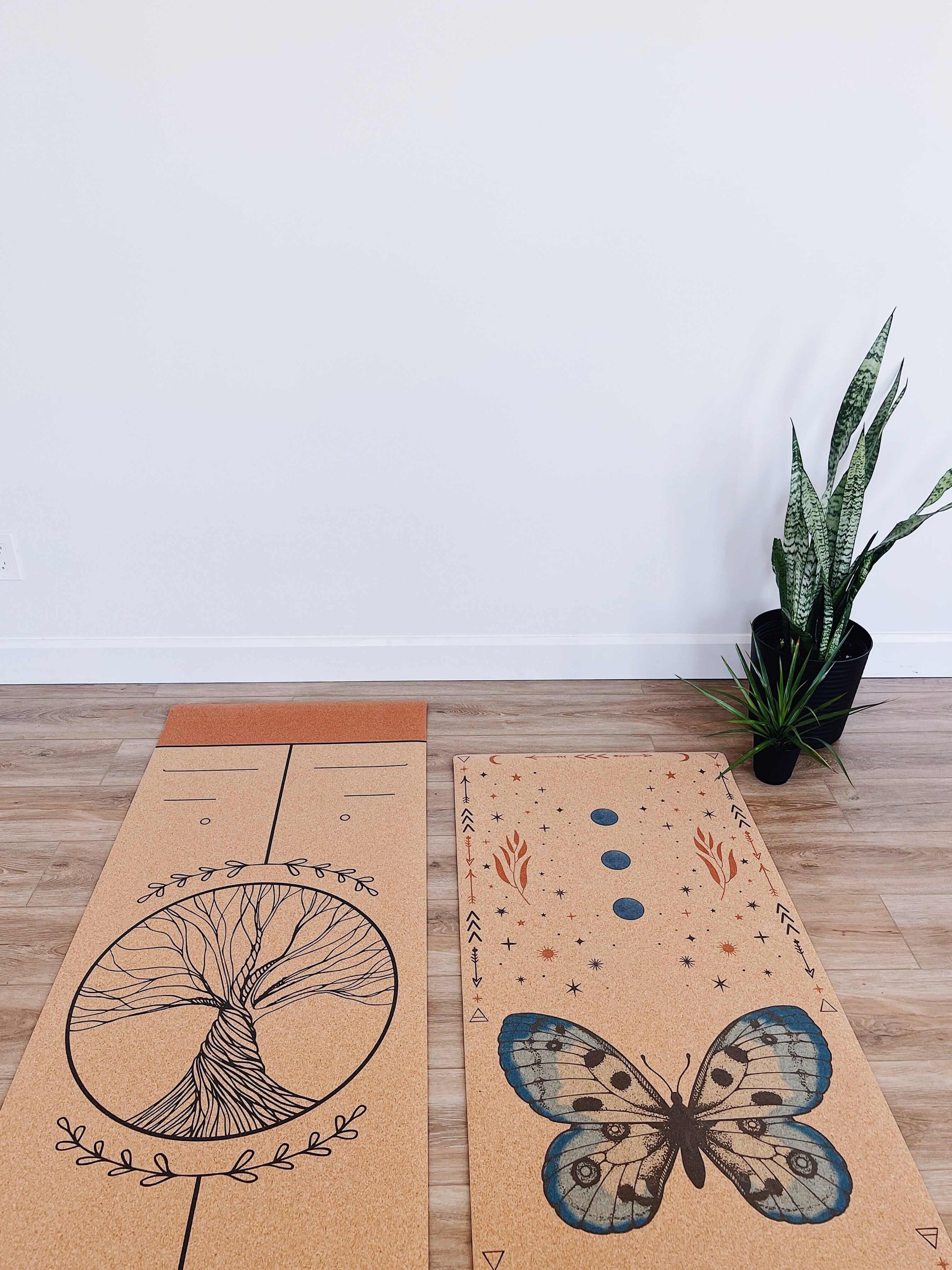 extra thick cork yoga mat  beside a regular cork yoga mat