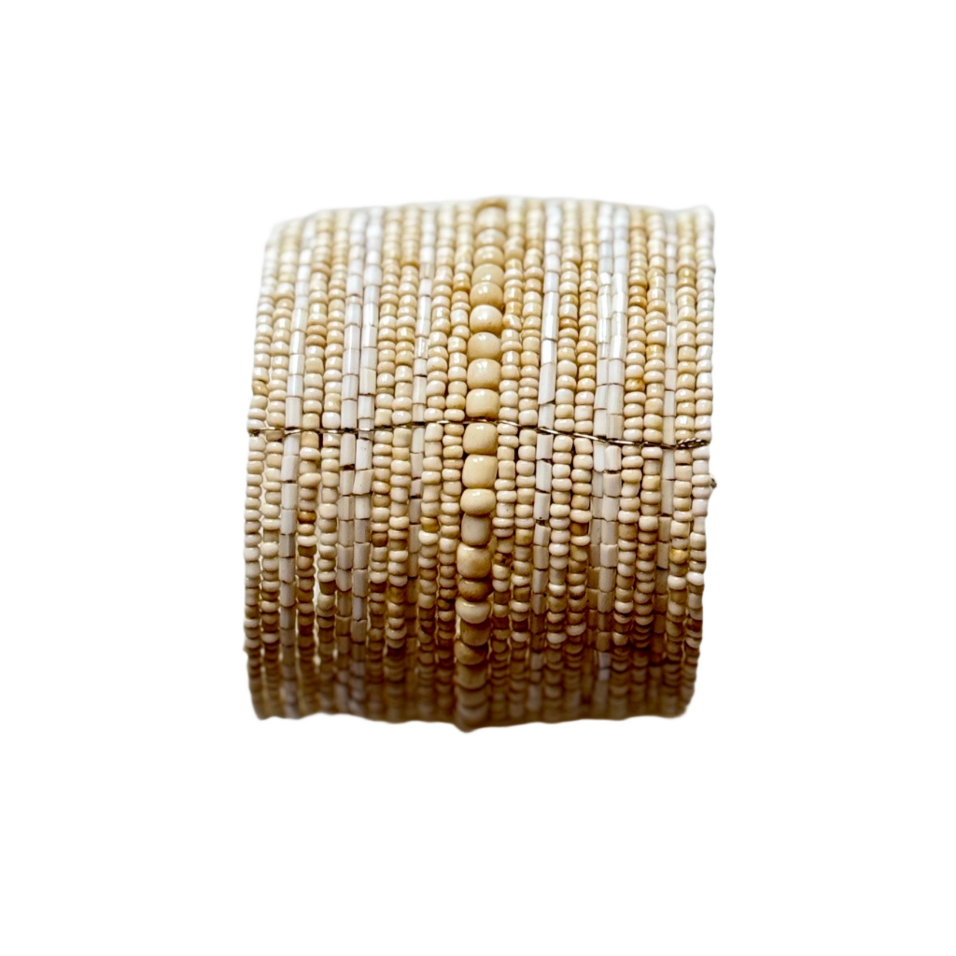 Mixed bead stacking cuff bracelet handmade Bali jewelry side view of beige
