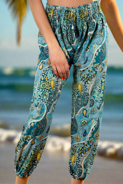 Handmade blue gold print Bali pants fabric texture close up