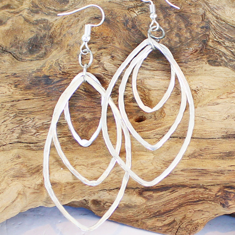 Silver plate triple oval metal drop earrings elegant dangle jewelry handmade in bali close up view