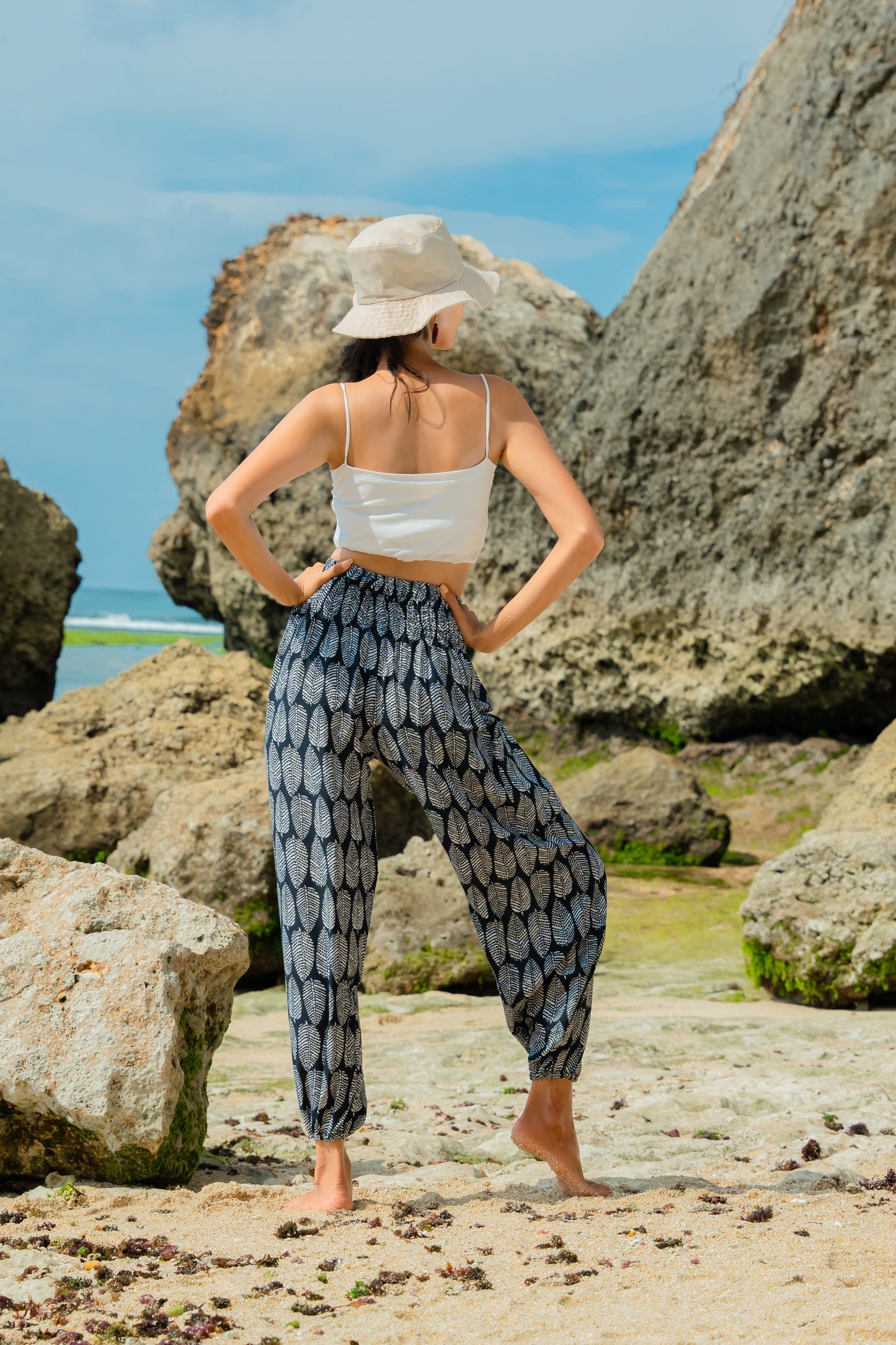 Black and white leaf print Bali pants handmade boho women's trousers back view