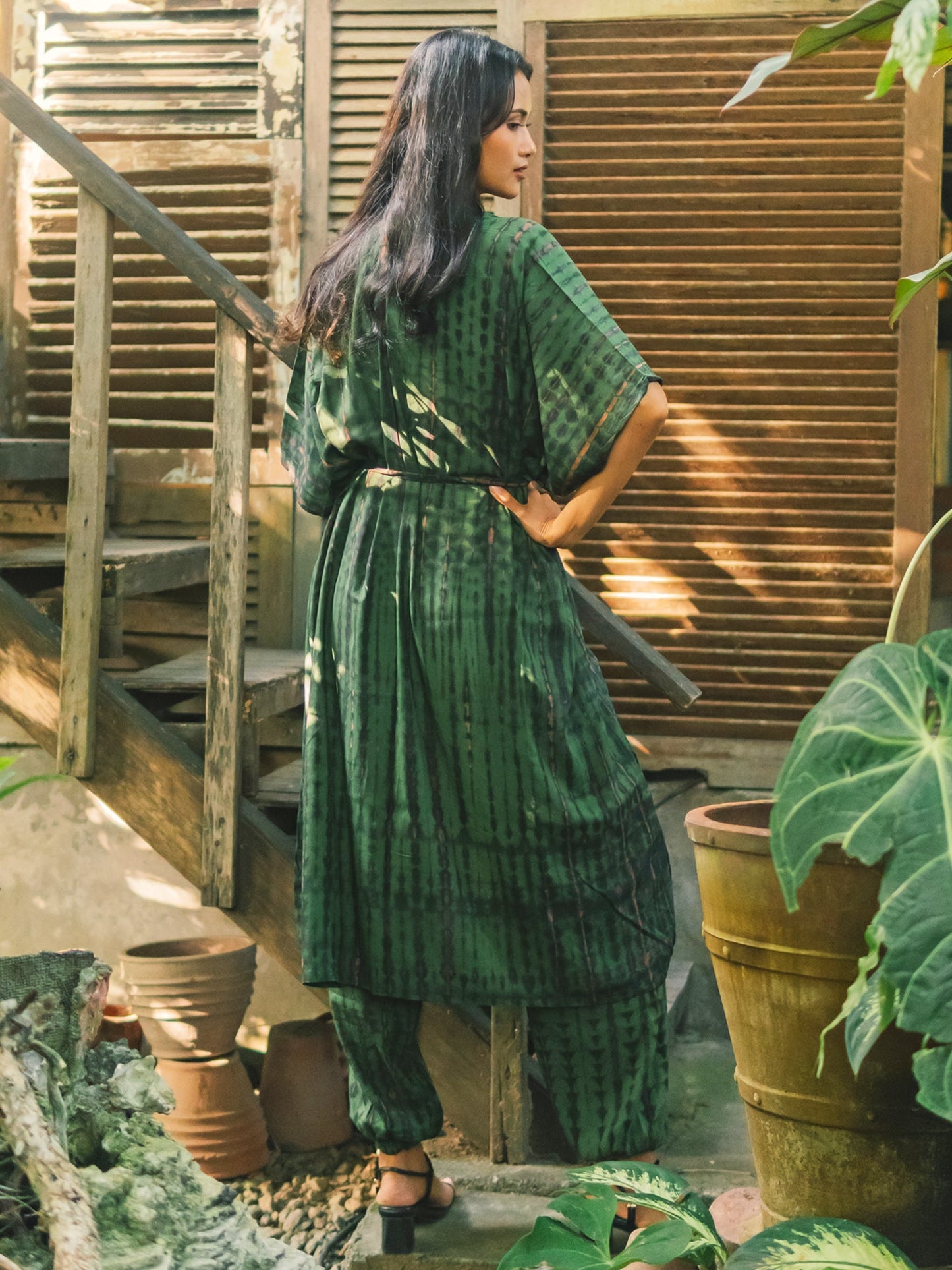 Handmade tie dye long kimono in green gold back view Bali artisan clothing