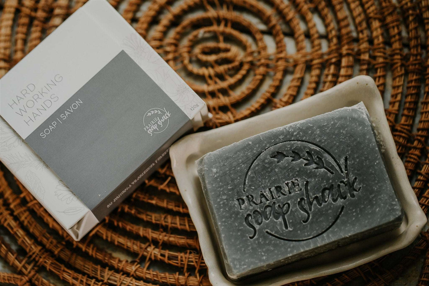 Hard working hands soap bar in lifestyle setting for workshop, garden and outdoor use