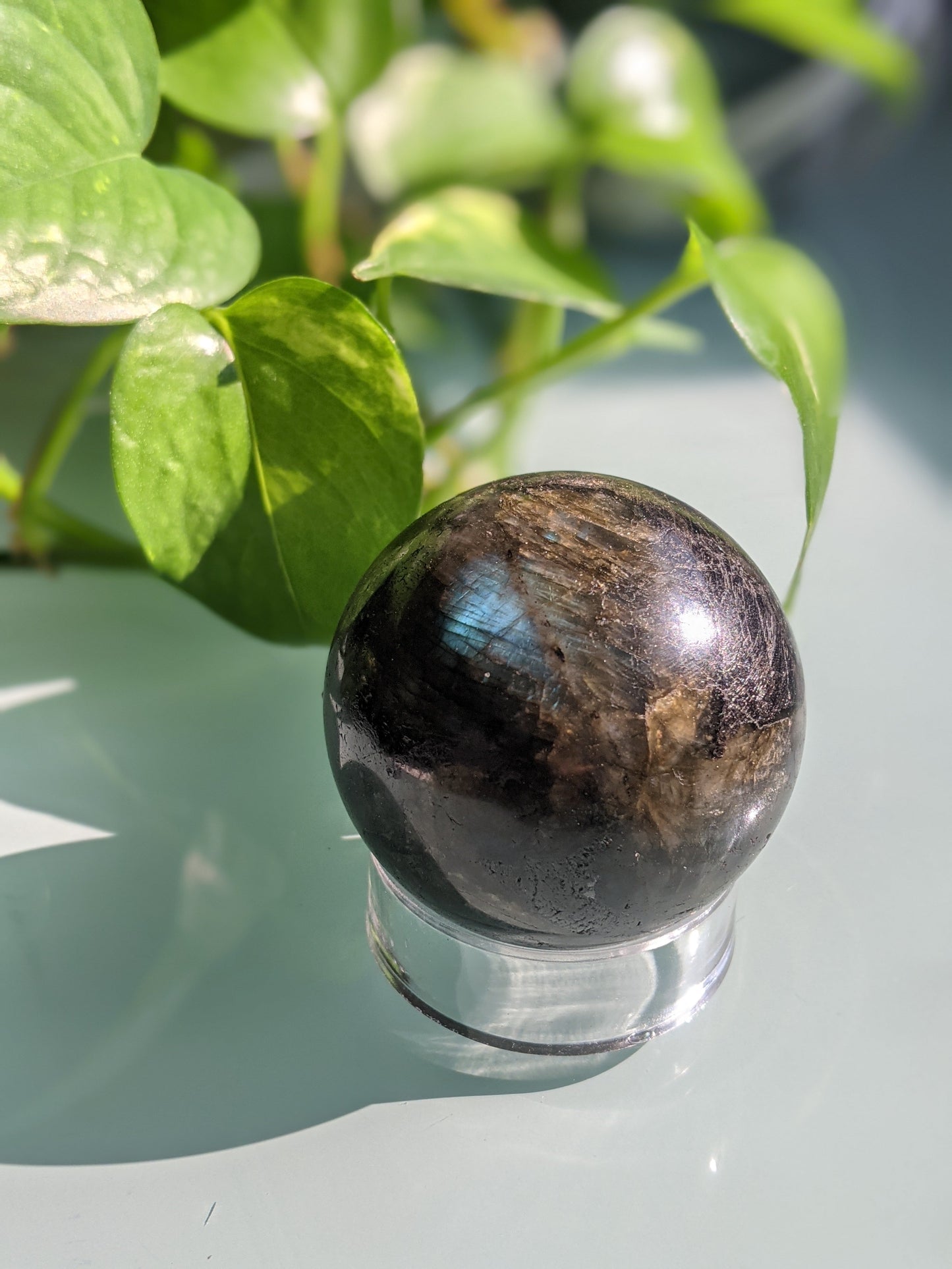 Mystical and intuition-awakening labradorite sphere with stunning iridescent flash