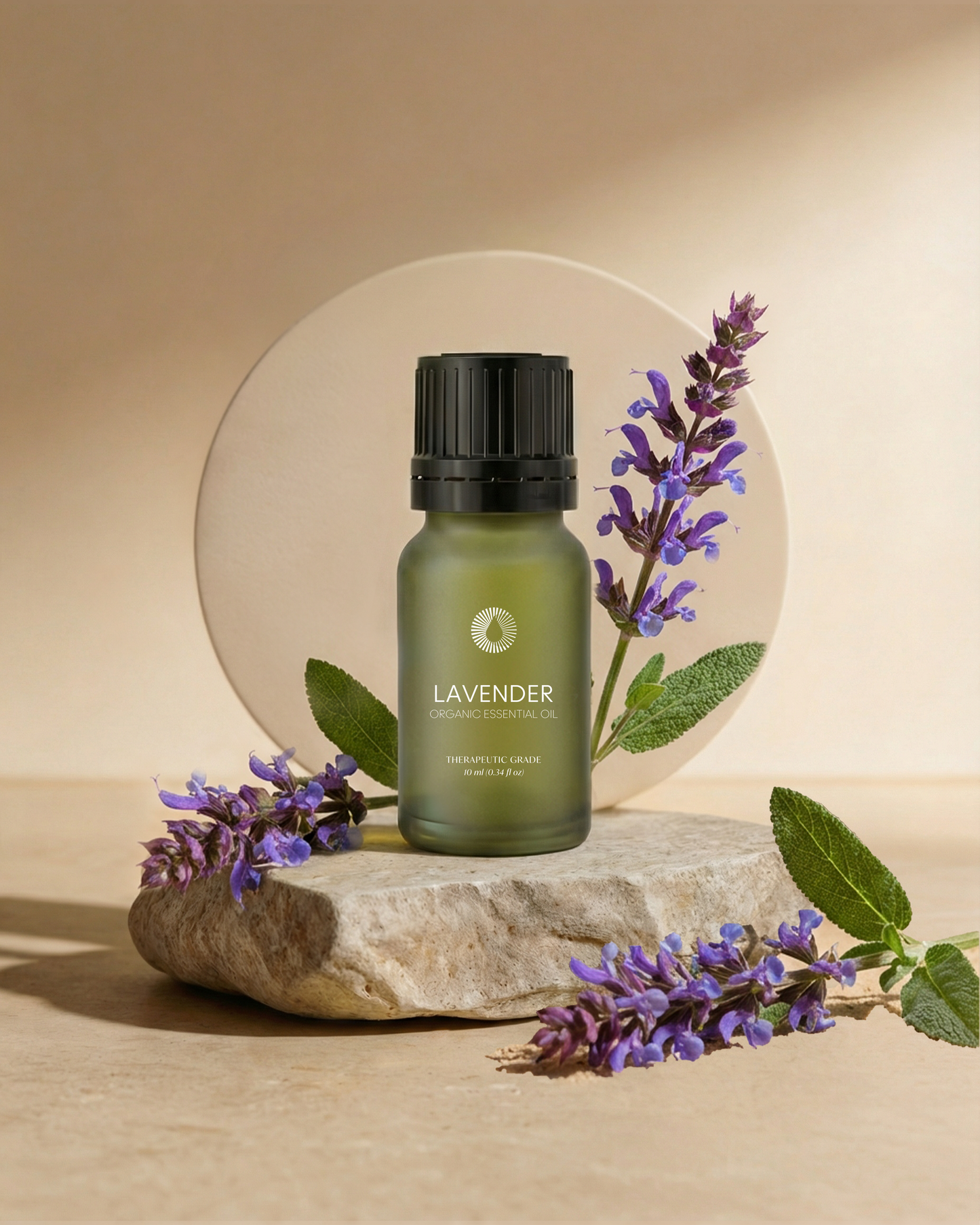 organic lavender essential oil aromatherapy bottle on a stone surface with lavender flowers and leaves.
