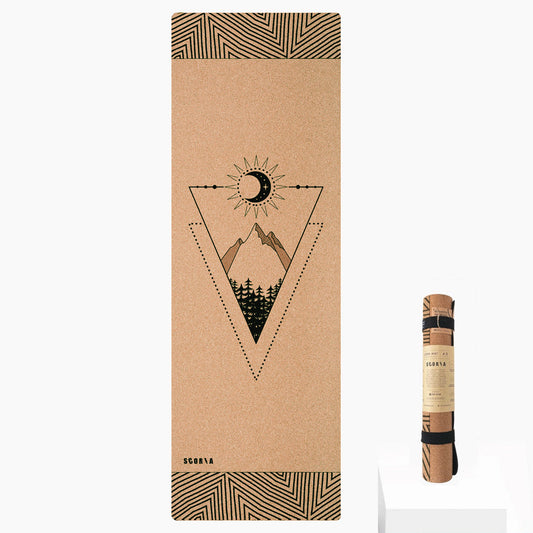 cork yoga mat with mountain and moon design on a white background