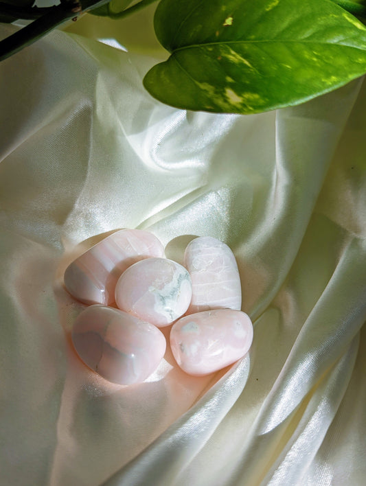 Gentle and heart-soothing mangano calcite tumbled stones for self-love and emotional calm