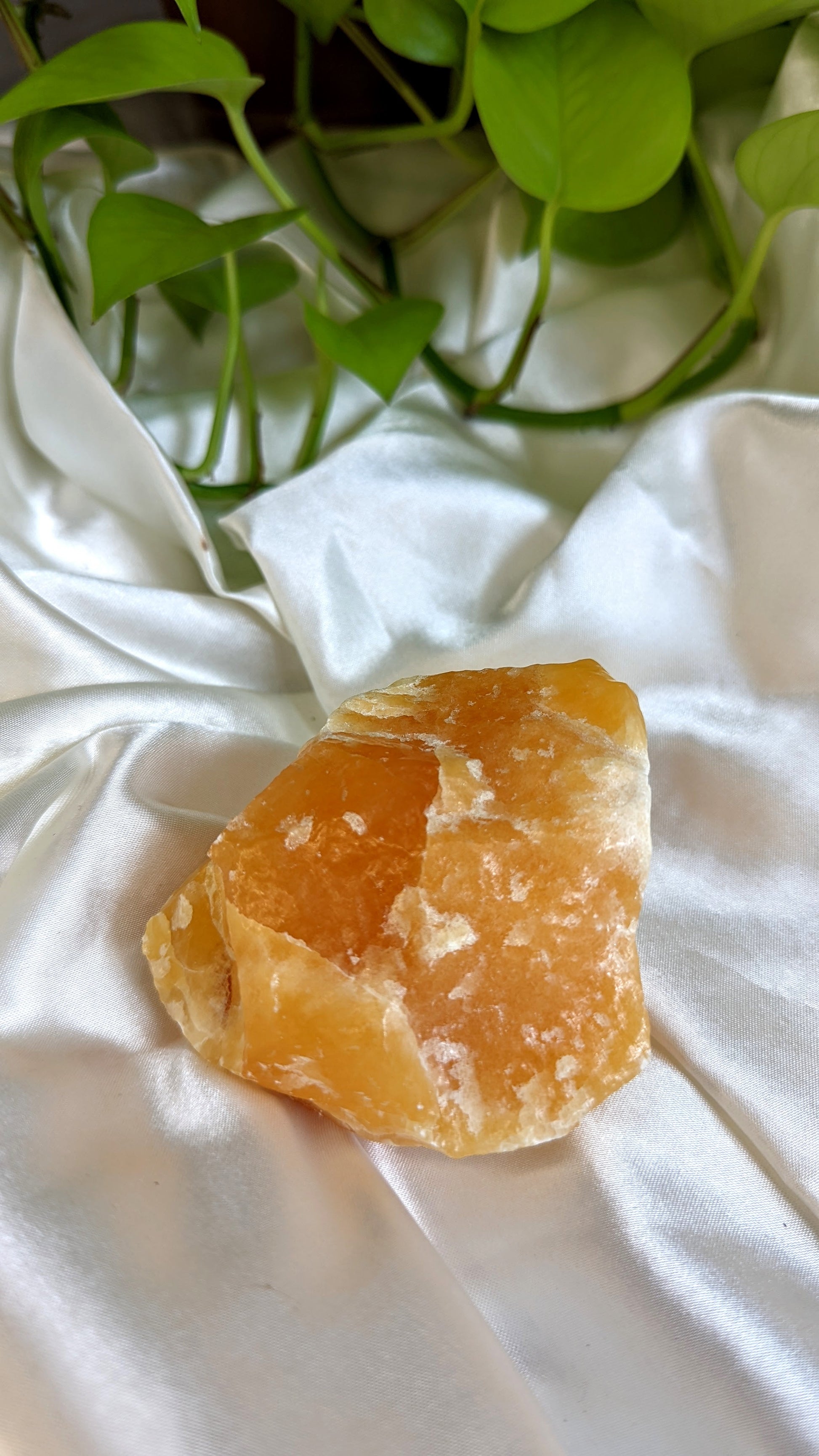 Joyful and creativity-boosting orange calcite crystal for sacral chakra healing and energy