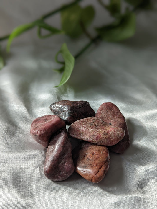 Compassionate and heart-healing rhodonite crystal for forgiveness and emotional recovery