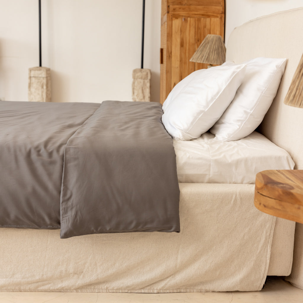 Bamboo sateen duvet cover set on bed — temperature-regulating luxury bedding