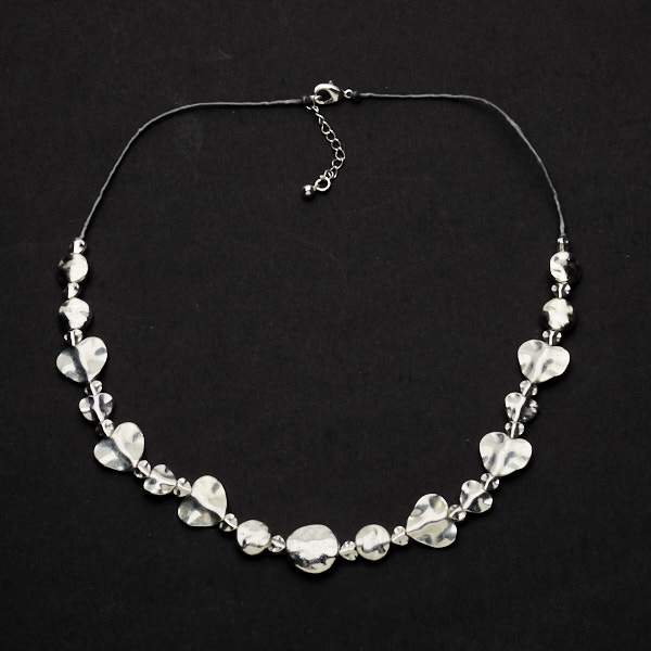 Handmade silver beaten heart necklace artisan jewelry