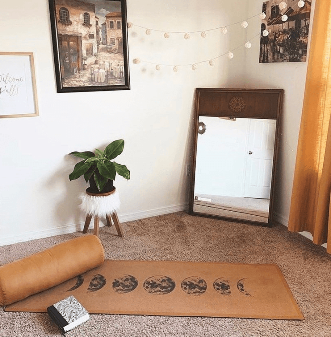 full view of Cork yoga mat with moon phase design in a living room
