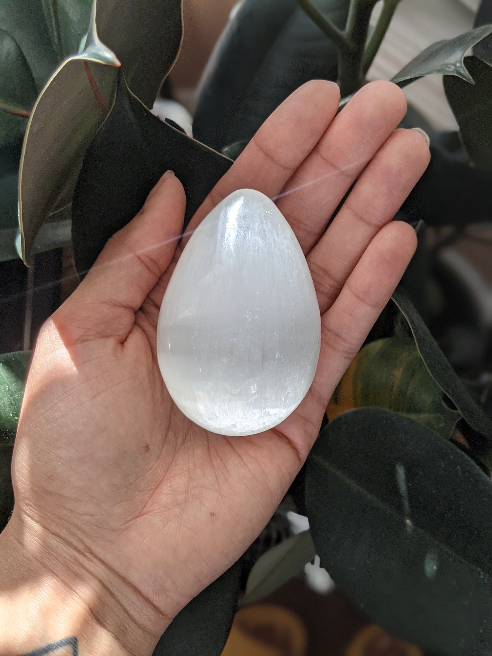 Purifying and fertility-symbolizing selenite egg for cleansing and new beginnings