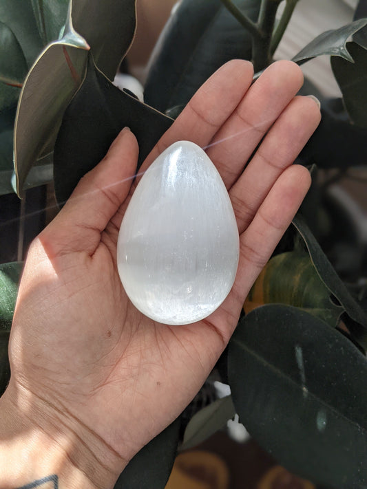 Purifying and fertility-symbolizing selenite egg for cleansing and new beginnings