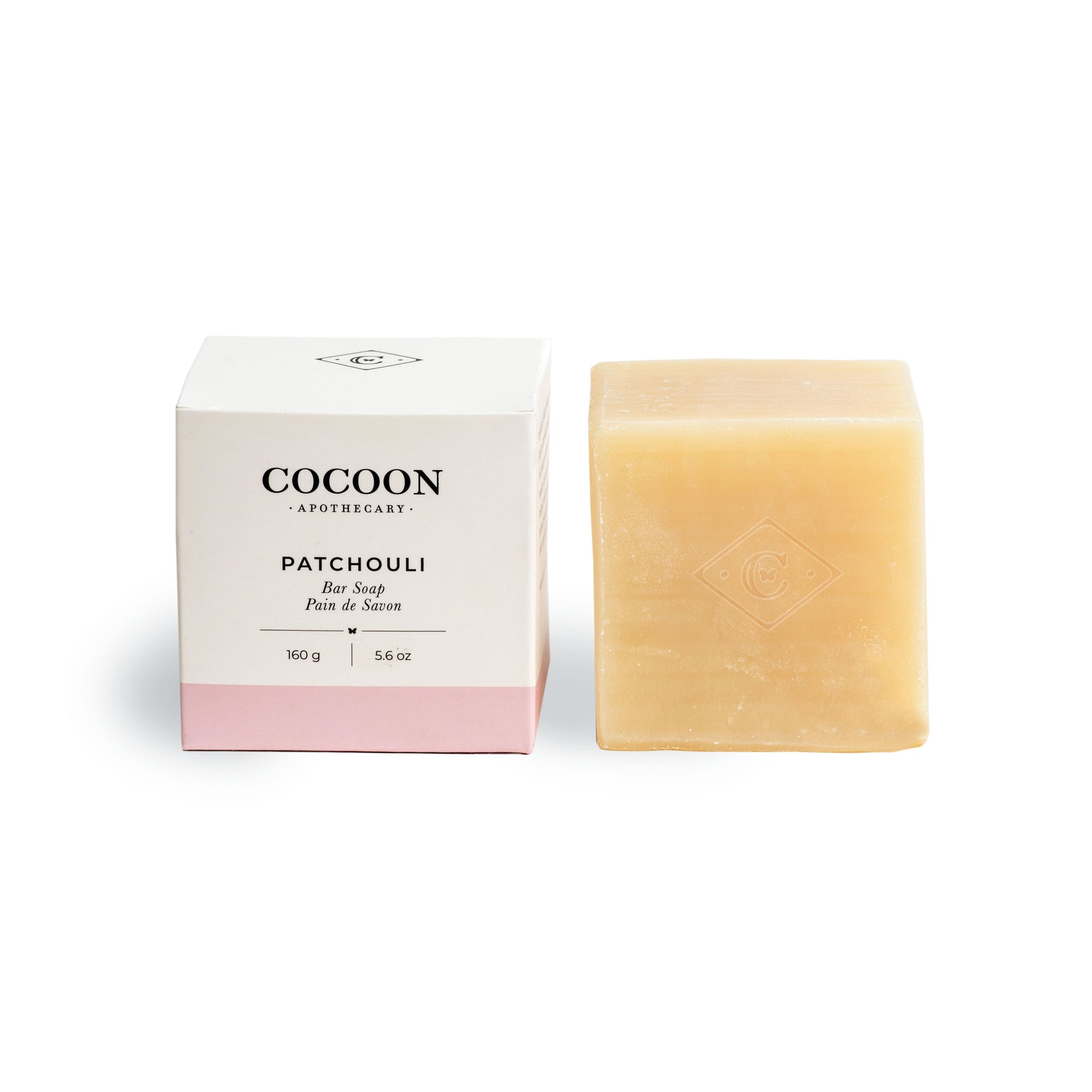 Cocoon Apothecary patchouli bar soap with packaging on a white background