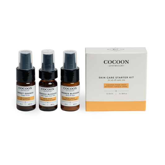 Cocoon skin care starter kit with three bottles and a box on a white background